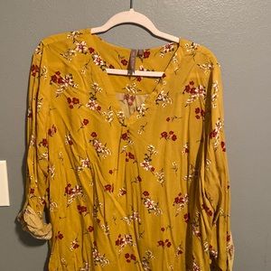 Very pretty mustard top with flowers